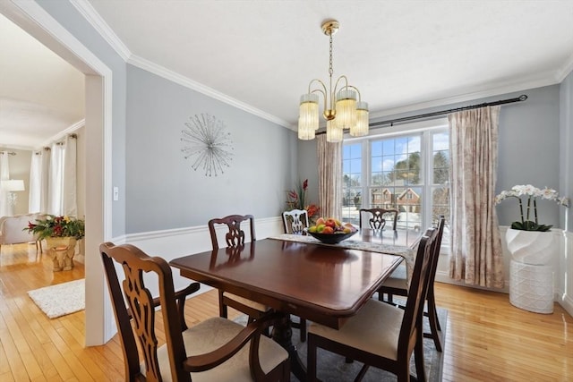 6 Hutchins Way, Westford, MA 01886 - dining space with crown molding, a chandelier, and light wood-style floors