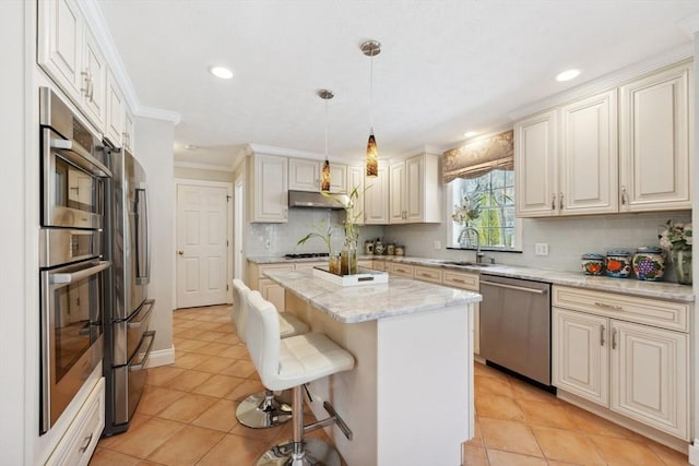 6 Hutchins Way, Westford, MA 01886 - kitchen featuring stainless steel appliances, a sink, light tile patterned floors, a center island, and recessed lighting