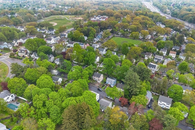 aerial overview of property's location with nearby suburban area