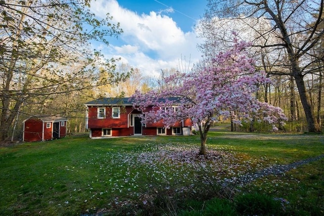 8 Adams Rd, Hubbardston, MA 01452 - view of front of house with a front yard and a storage unit