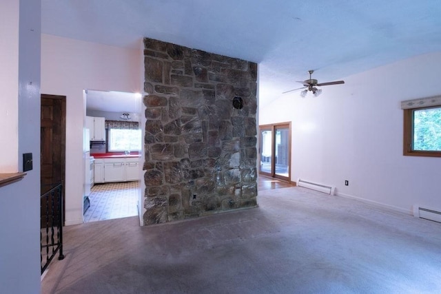 8 Adams Rd, Hubbardston, MA 01452 - unfurnished living room with a baseboard radiator, healthy amount of natural light, ceiling fan, and carpet floors