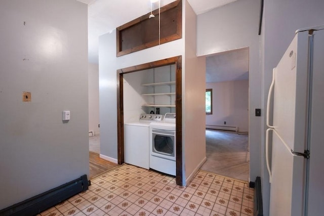 8 Adams Rd, Hubbardston, MA 01452 - laundry area featuring washing machine and clothes dryer, baseboard heating, and light floors