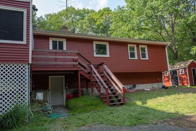 8 Adams Rd, Hubbardston, MA 01452 - back of house with a storage shed, stairs, a lawn, a wooden deck, and a chimney