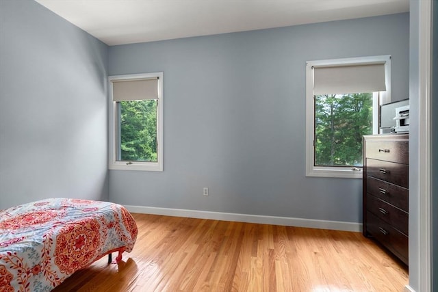 14 Sandpiper Hl, Sharon, MA 02067 - bedroom featuring multiple windows and light wood-type flooring