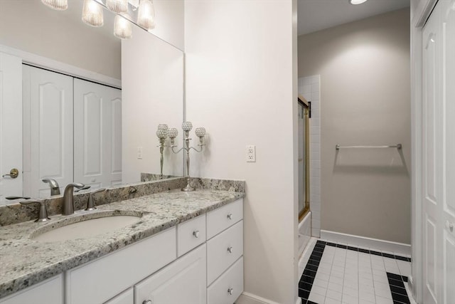 14 Sandpiper Hl, Sharon, MA 02067 - full bathroom featuring vanity, tile patterned flooring, and bath / shower combo with glass door