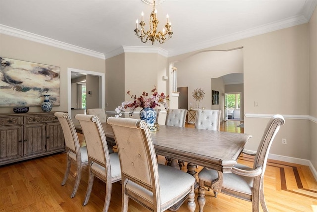 14 Sandpiper Hl, Sharon, MA 02067 - dining area featuring light wood-type flooring, a chandelier, and crown molding