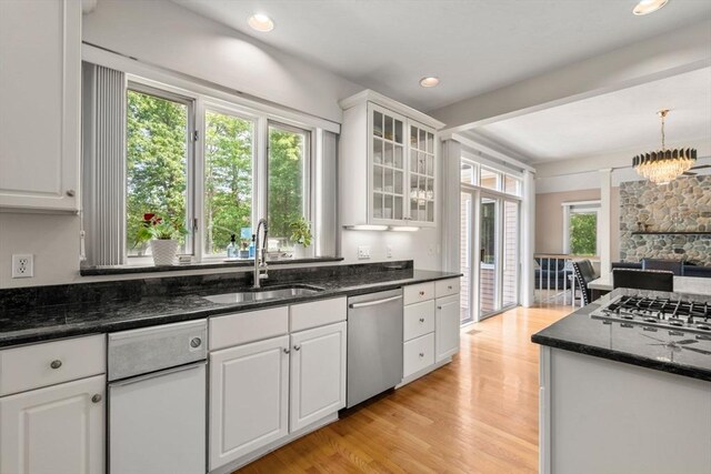 14 Sandpiper Hl, Sharon, MA 02067 - kitchen featuring appliances with stainless steel finishes, white cabinets, glass insert cabinets, dark stone counters, and recessed lighting