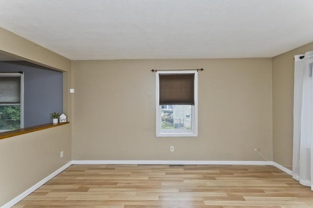 52 Marmon Ct, Springfield, MA 01129 - spare room featuring light wood-type flooring and baseboards