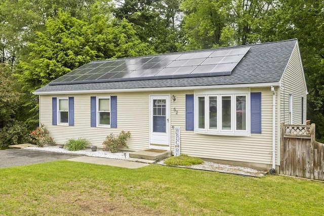 52 Marmon Ct, Springfield, MA 01129 - view of front facade featuring roof with shingles and solar panels
