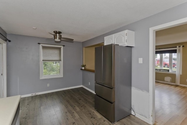 52 Marmon Ct, Springfield, MA 01129 - kitchen featuring freestanding refrigerator, white cabinets, a ceiling fan, and healthy amount of natural light