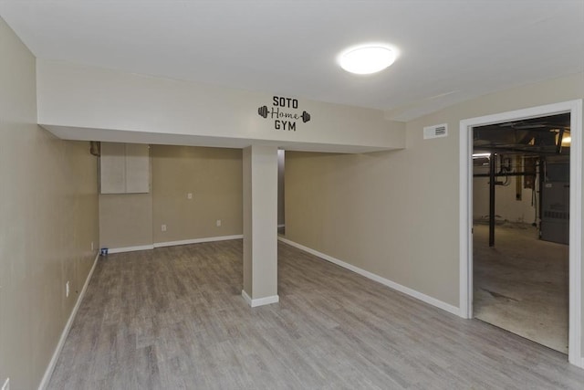 52 Marmon Ct, Springfield, MA 01129 - finished basement with light wood-style floors and baseboards