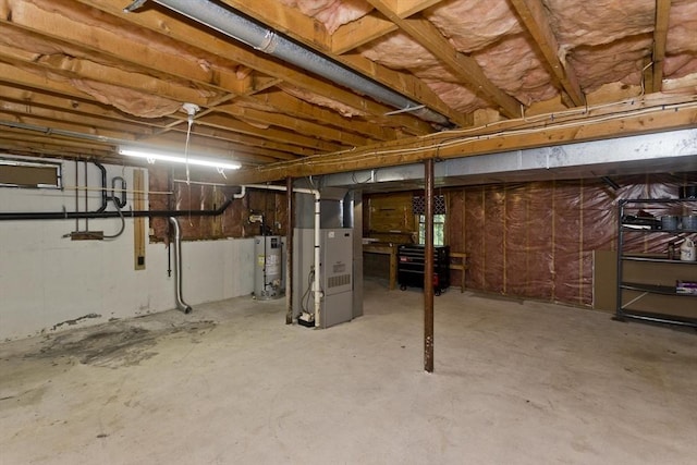 52 Marmon Ct, Springfield, MA 01129 - unfinished below grade area featuring gas water heater and heating unit