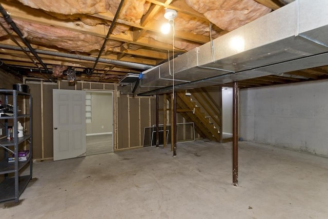 52 Marmon Ct, Springfield, MA 01129 - unfinished basement featuring stairway