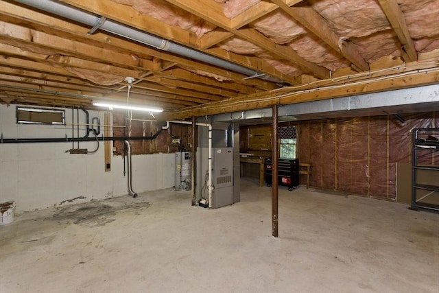 52 Marmon Ct, Springfield, MA 01129 - unfinished below grade area featuring heating unit and water heater