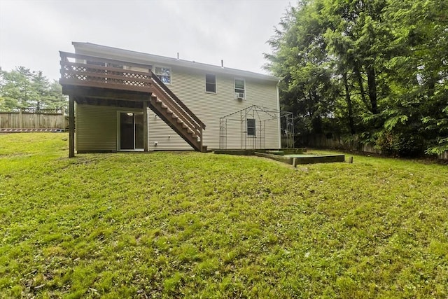 52 Marmon Ct, Springfield, MA 01129 - back of house with stairs, a wooden deck, and a vegetable garden