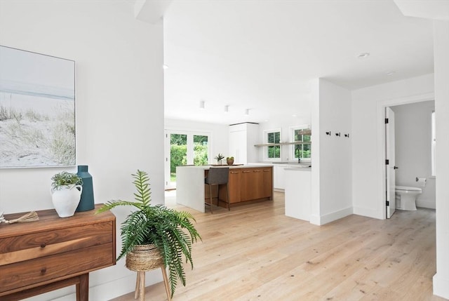 hallway featuring light hardwood / wood-style floors