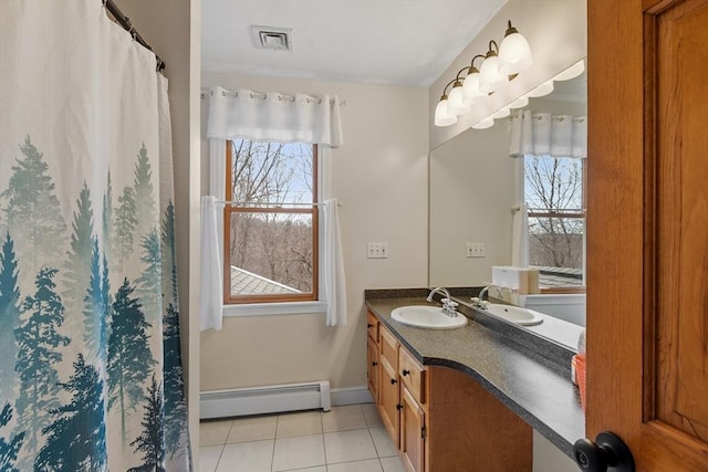 76 Woobly Rd, Bolton, MA 01740 - bathroom featuring baseboard heating, vanity, tile patterned floors, and healthy amount of natural light
