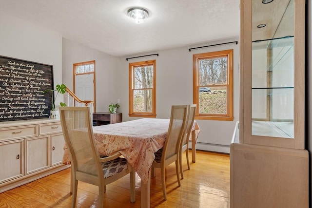 76 Woobly Rd, Bolton, MA 01740 - dining space featuring baseboard heating and light wood-style floors