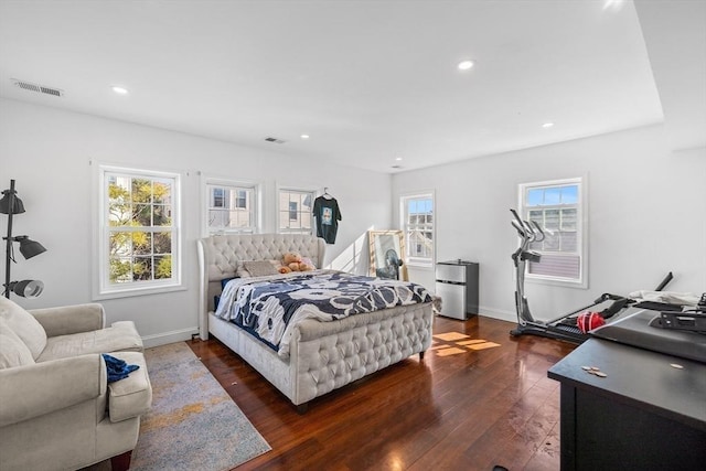 bedroom with recessed lighting, visible vents, dark wood-style flooring, and baseboards