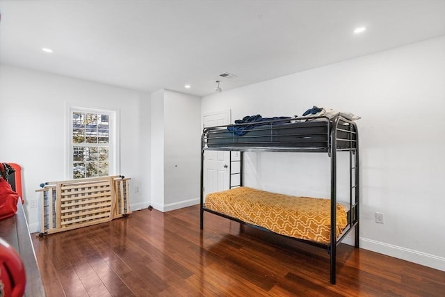 bedroom featuring visible vents, recessed lighting, baseboards, and wood-type flooring