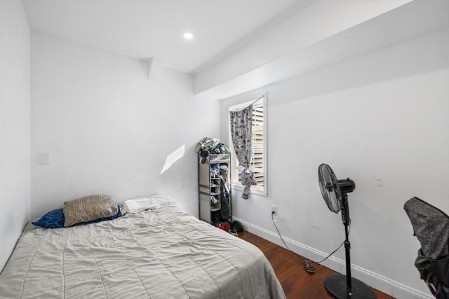 bedroom with recessed lighting, baseboards, and wood finished floors