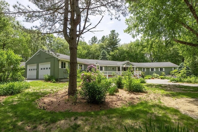 5 Deerfield Rd, Medway, MA 02053 - single story home with an attached garage and a front yard