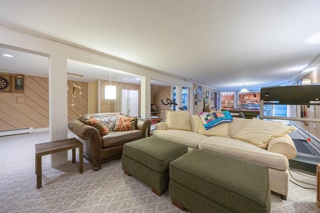 5 Deerfield Rd, Medway, MA 02053 - living room with light carpet, wooden walls, and a baseboard heating unit