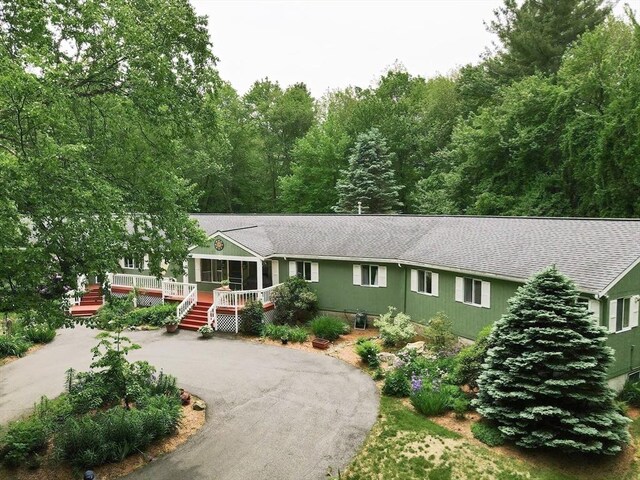 5 Deerfield Rd, Medway, MA 02053 - view of front facade featuring roof with shingles and asphalt driveway
