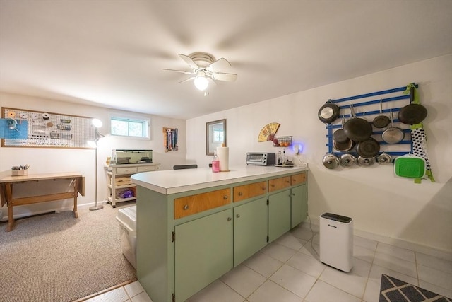 5 Deerfield Rd, Medway, MA 02053 - kitchen featuring a peninsula, light countertops, ceiling fan, green cabinets, and baseboards