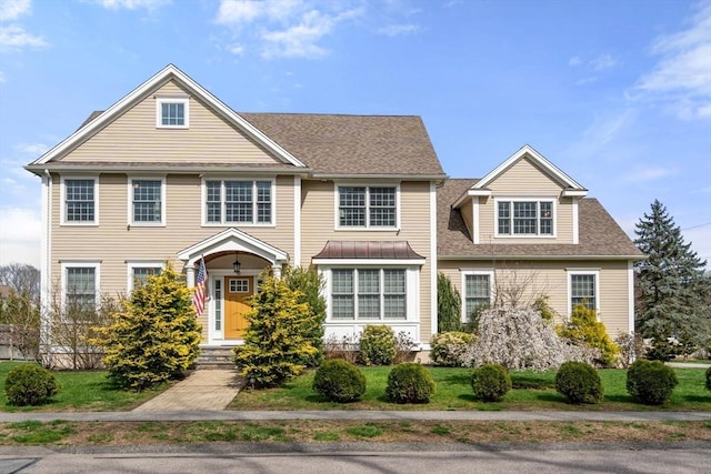 50 Sterling Rd, Needham, MA 02492 - view of front of home with roof with shingles