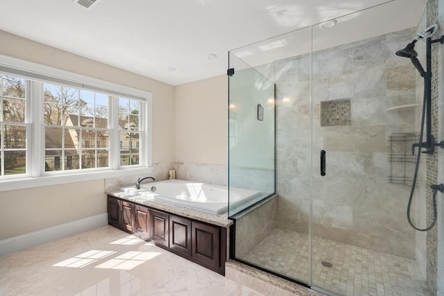 50 Sterling Rd, Needham, MA 02492 - bathroom with a garden tub, a shower stall, and baseboards
