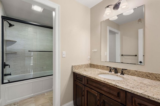 50 Sterling Rd, Needham, MA 02492 - bathroom featuring vanity, enclosed tub / shower combo, and baseboards