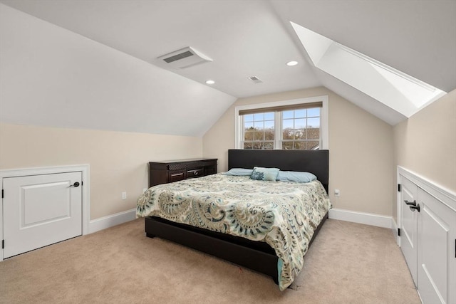 50 Sterling Rd, Needham, MA 02492 - bedroom with carpet floors, vaulted ceiling, baseboards, recessed lighting, and a skylight