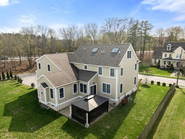 50 Sterling Rd, Needham, MA 02492 - back of property featuring a shingled roof