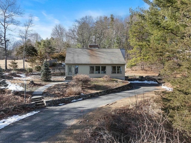 view of front of house with a chimney