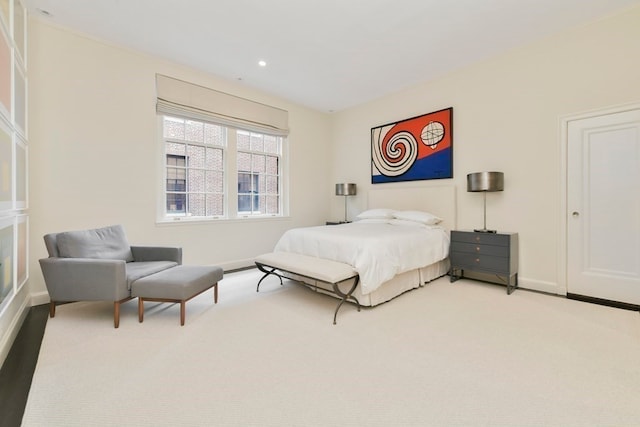 bedroom with light carpet