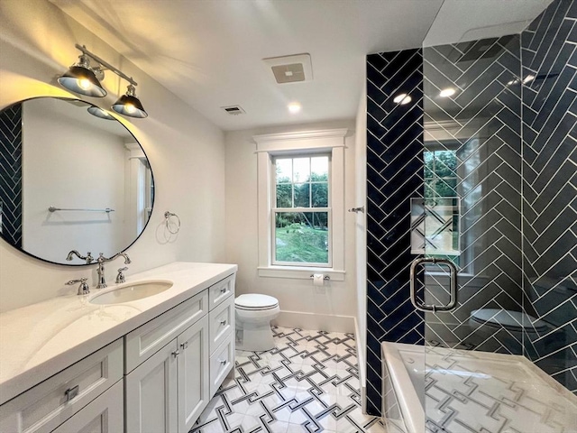 full bath with vanity, baseboards, visible vents, a stall shower, and toilet