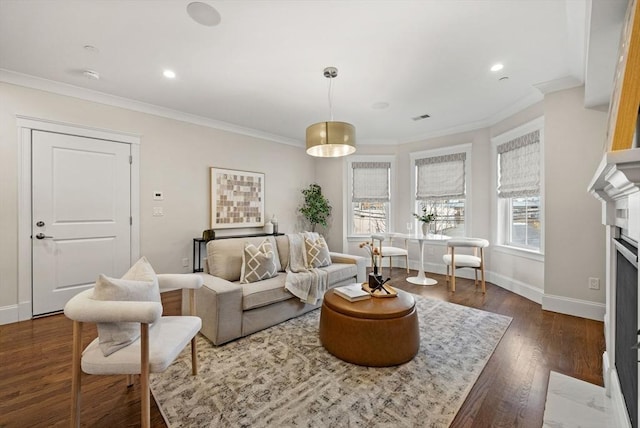 living room with crown molding and dark hardwood / wood-style floors