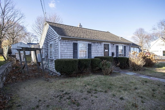 view of property exterior featuring a yard