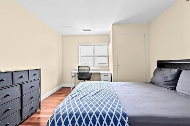 211 Central St Unit A311, Norwood, MA 02062 - bedroom featuring wood finished floors and baseboards