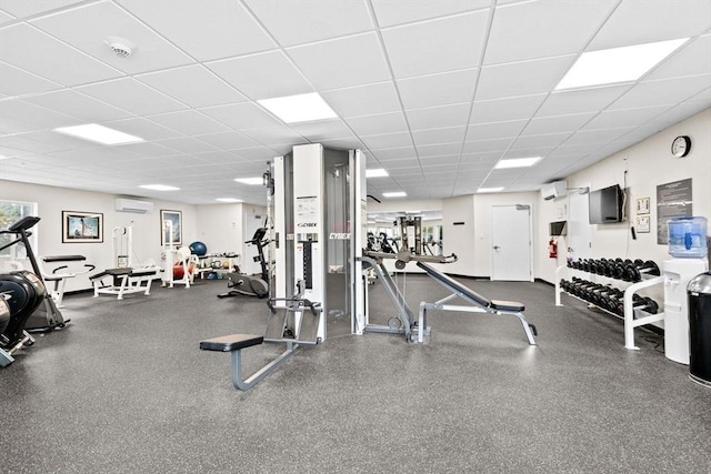 211 Central St Unit A311, Norwood, MA 02062 - exercise room with a wall mounted air conditioner and a drop ceiling