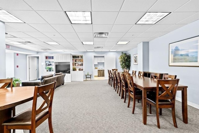 211 Central St Unit A311, Norwood, MA 02062 - carpeted dining room featuring a paneled ceiling