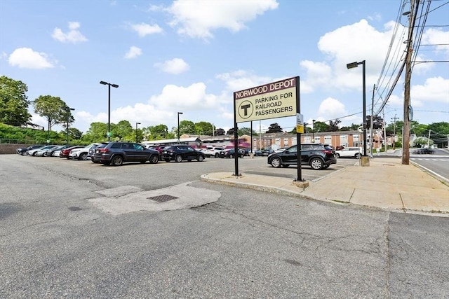 211 Central St Unit A311, Norwood, MA 02062 - view of asphalt road featuring street lights