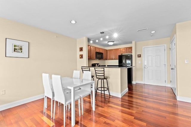 211 Central St Unit A311, Norwood, MA 02062 - dining room with wood finished floors and recessed lighting