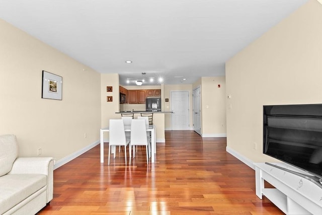 211 Central St Unit A311, Norwood, MA 02062 - dining space with light wood-style floors and recessed lighting