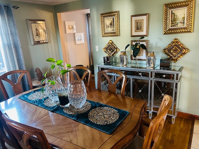 dining room featuring tile patterned flooring