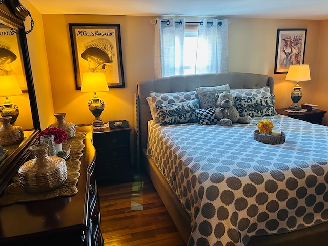 bedroom featuring dark wood-type flooring