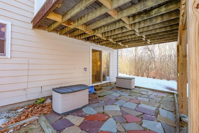 view of snow covered patio