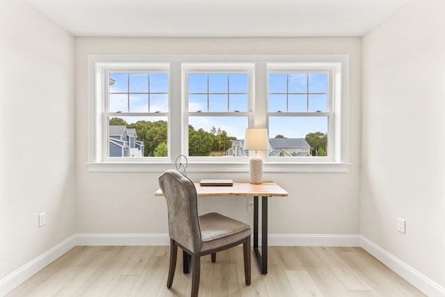 home office featuring light hardwood / wood-style flooring