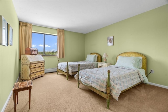 carpeted bedroom with baseboards and baseboard heating
